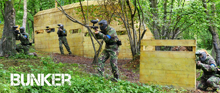 <Small photograph of paintball player behind the Bunker>