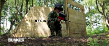 <Small image of a Paintball player behind the Bunker>